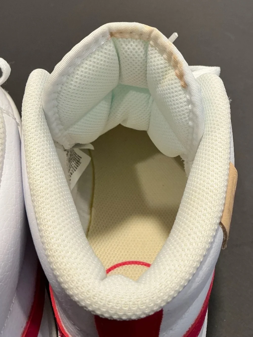 Nike swoosh size out